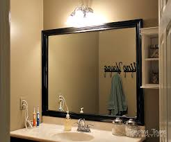 framing a bathroom mirror tempting thyme