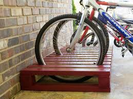 Many garages are so tiny that simply leaning it against the side of the wall will hardly leave any space for your car. Diy Bike Rack Hgtv