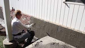 stucco over brick walls you
