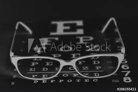 Eyeglasses On Eyesight Test Chart Background Buy This