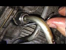 remove chevy transmission cooling lines