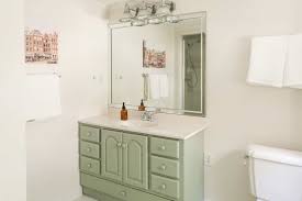 Frame out old construction mirror, purchase a new one or leave your current one.grab the template and line it up with the edge of the cabinet door.here is a recap of how to redo a bathroom vanity cheaply. I Painted Our Bathroom Vanity A Beautiful Mess