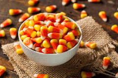 How do I calculate the number of candy corn pieces in a jar?