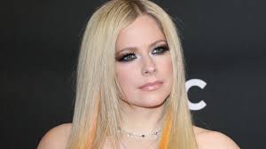 avril lavigne puts on very cheeky