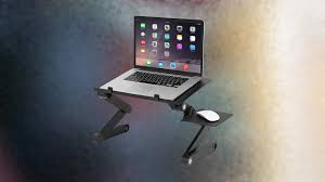 This midsize computer tripod table extends up to 41 tall. Best Laptop Stand 2021 Ergonomic Laptop Risers For Your Setup Ign