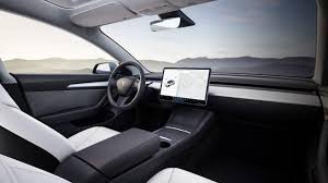 tesla is set to ditch wood trims for