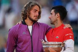 Serbian novak djokovic smashed an overhead return onto the clay court to win match point in a marathon french open men's final against greece's stefanos tsitsipas to capture his 19th career major. S9qbeok4rt9vwm