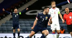 Steve clarke's men hammer visitors as goals from che adams scotland raced into an early lead courtesy of a neat finish from john mcginn the midfielder was at it again after the break to put scotland firmly in control Rftgm7fjuu4qzm