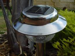 solar vs wired landscape lighting and