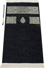 muslim prayer rug with prayer beads