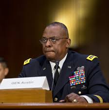 Lloyd austin, a recently retired army general, smiles during his conformation hearing. Biden Plans To Tap Lloyd Austin Former Iraq Commander As Defense Secretary The New York Times