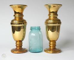 2 large antique gold mercury glass