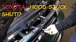 how to open a hood that is stuck shut