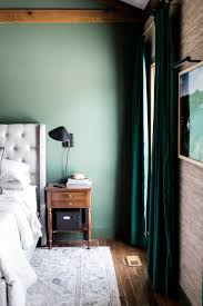 Dark Green Bedroom With Eclectic Decor