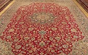 kashmiri silk black carpet and red