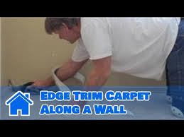 how to edge trim carpet along a wall