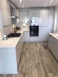 The light gray marble touch as a countertop and full backsplash is a great idea to give some texture to space! Sms Kitchens Latest News Light Grey Handleless Contemporary Kitchen
