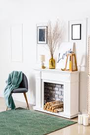 Pale Stone Fireplaces And White Mantel