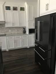 Photo by rufty custom built homes and remodeling. Black Stainless Kitchenaid Appliances White Cabinets Black Appliances Kitchen White Cabinets Black Appliances Appliances White Cabinets