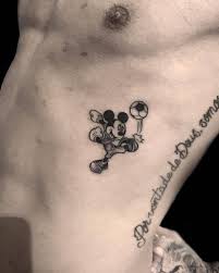 Celebrities, tattooed footballers, tattooed male celebrities, neymar, tattooed brazilian male celebrities, categories, lettering, native americans, feathers, other, dark skin, quotes, english quotes, dream chaser, languages, english. Mickey Mouse Tattoo On Neymar Junior Mickey Mouse Tattoo Mouse Tattoos Neymar Jr Tattoos