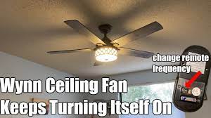 wynn ceiling fan turns on by itself