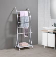 Crafted from metal, it features a tubular construction with two rods, while a lower shelf provides a place to tuck away folded items. Twilio Freestanding 5 Tier Bathroom Towel Rack With Storage Shelf White Metal Walmart Com Walmart Com