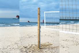 wall or post mounted volleyball system