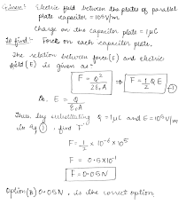 Two parallel infinite line charges with linear charge densities + lambda  C/m and - lambda C/m are placed at a distance of 2R in free space. What is  the electric field mid -