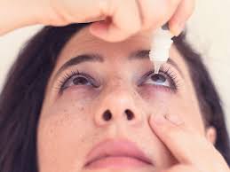 can you wear contact lenses with pink eye