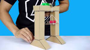 a crane machine toys using cardboard