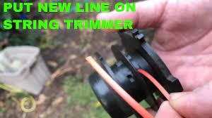 Restring a 2 sided spool on a string trimmer weed eater EASY!! - YouTube