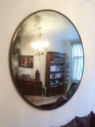 Antiqued Convex Mirror With Aged Brass