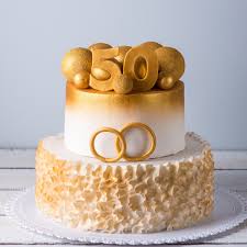 The light green cake with white coloured honey buttercream icing is as delightful to the eye as it is to the stomach. 50th Wedding Anniversary Party Ideas Thriftyfun