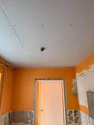 It has always been the case that suspended ceiling tiles could not be painted because water based paint would be absorbed by the ceiling tiles and cause warping. Aml Plastering Kitchen Stripped Tiles Taken Off Ceiling Facebook