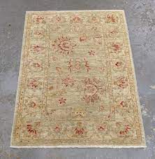 green peshawar area rug perfect for a