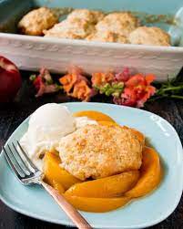 homemade peach cobbler with biscuits