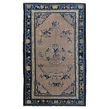 antique chinese rug tan and blue