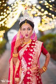 photo of pretty bengali bride in