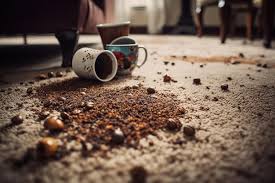 a coffee cup and a pile of coffee beans