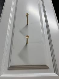 how to repair holes in cabinet doors