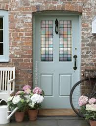 exterior wooden door with stained glass