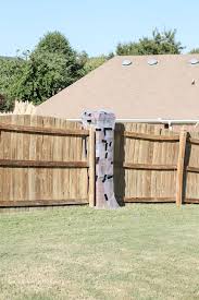 how to paint a wood fence the fast and