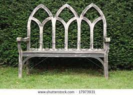 wooden gothic style bench in an english