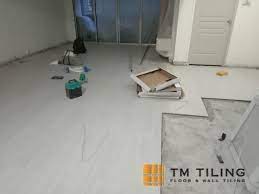 living room floor tile installation in