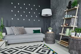 If you have pulled your couch and other living room furniture forward, you'll have a walkway and empty wall space behind prop a modern art canvas painting on a floating shelf with a few accompaniments. Modern Wall Decor Ideas And How To Hang Them Mymove