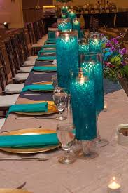 The color can be added as much or as little as you desire. Teal And Purple Wedding Reception Decor Candle Design Hyatt Regen Turquoise Wedding Decorations Teal Wedding Decorations Purple Wedding Reception Decorations