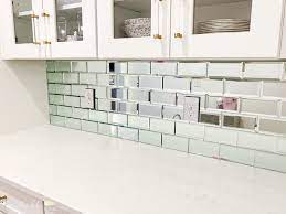 install a mirrored tile backsplash
