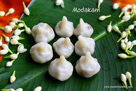 Image result for kozhukattai on a leaf in home