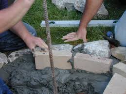 This should fill the bottom two layers of block to a depth of 8. How To Build A Stone Fire Pit How Tos Diy