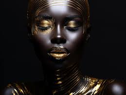 golden makeup and artistic body paint